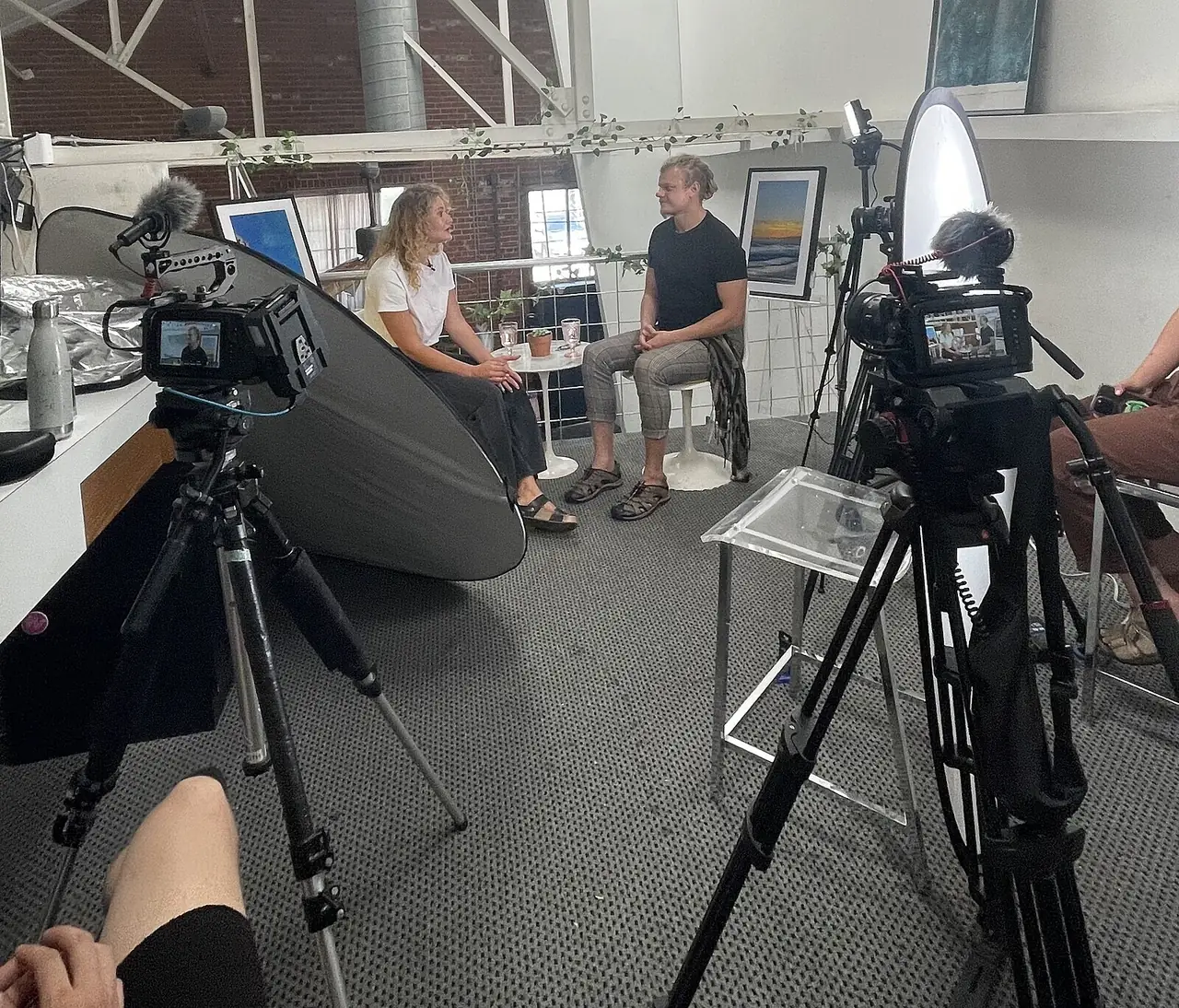 Two Blackmagic 6K cameras framing a sit-down interview in a bright loft