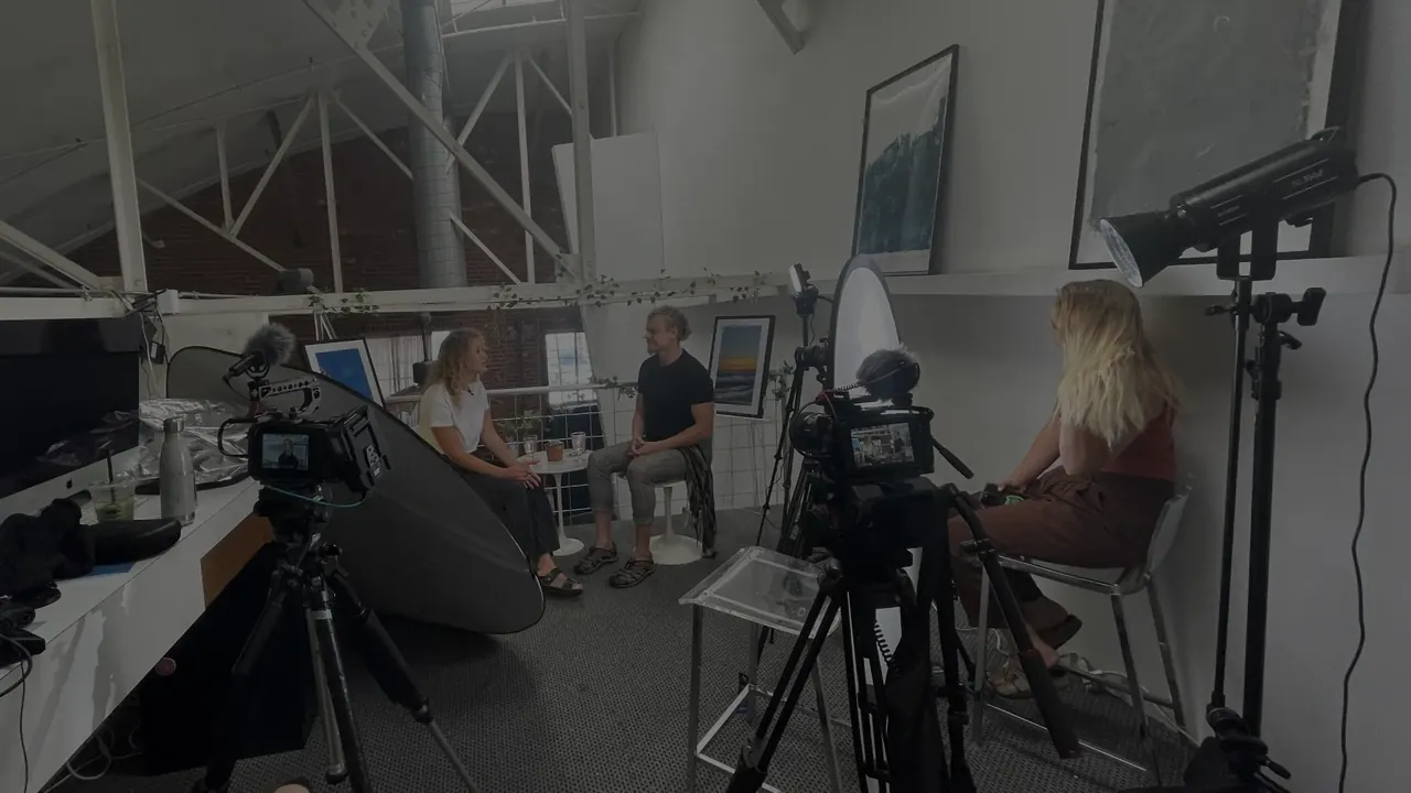 A three-camera podcast in a loft with softbox lighting